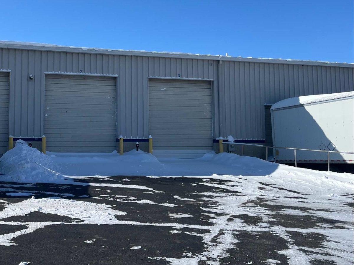 Overhead doors on the 7658 Fishel Drive N building