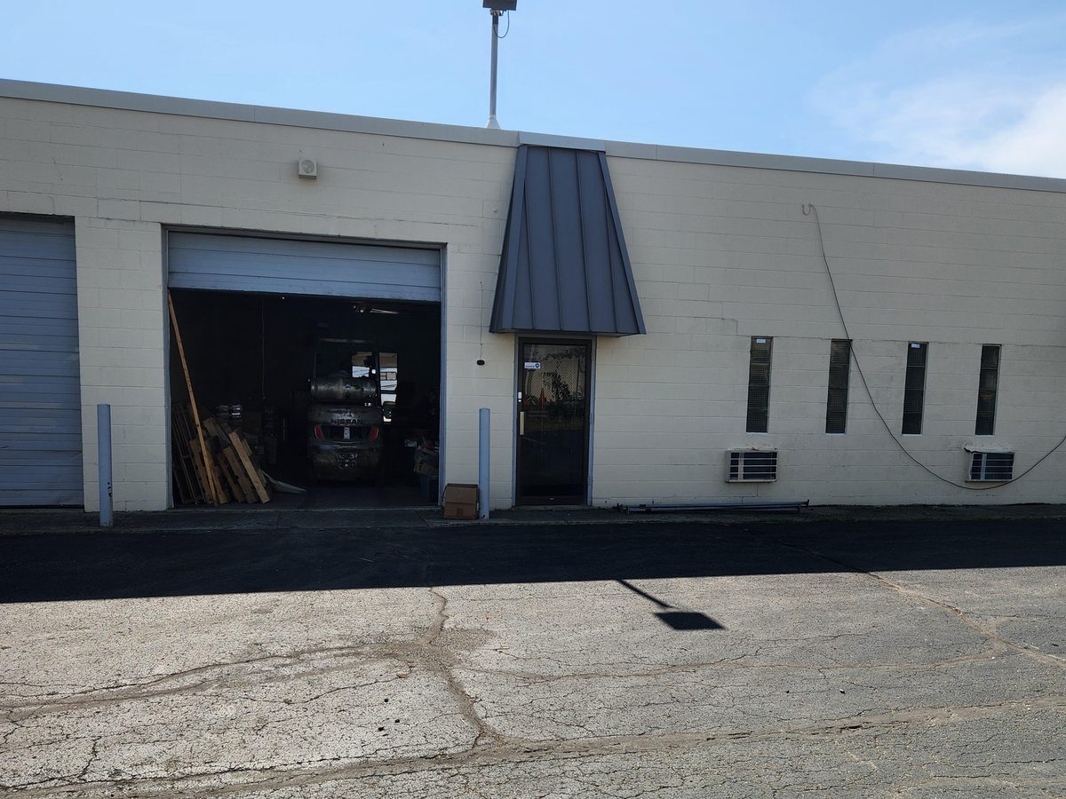A drive-in door and entry at 1100 Rarig Avenue